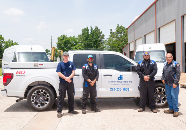 4 Danmar Industries crew members standing in front of their truck